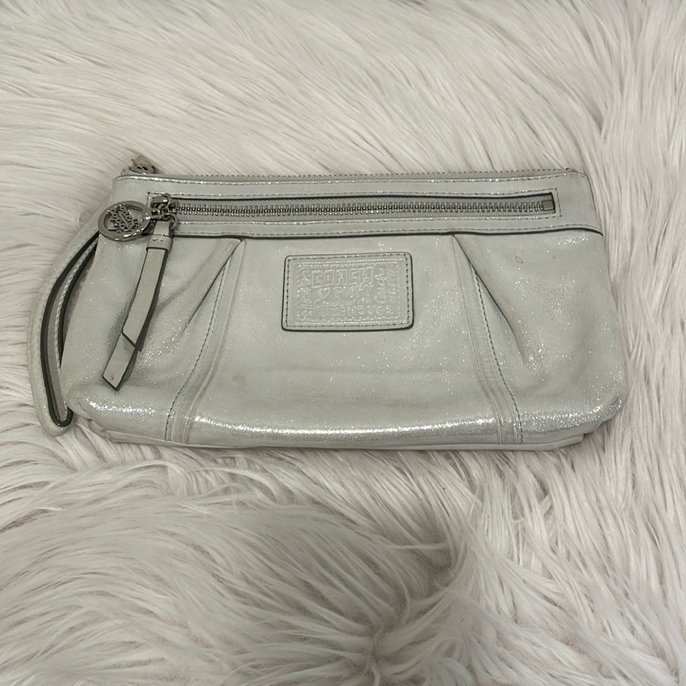 Coach Poppy wristlet with multicolor pinstripe lining preowned